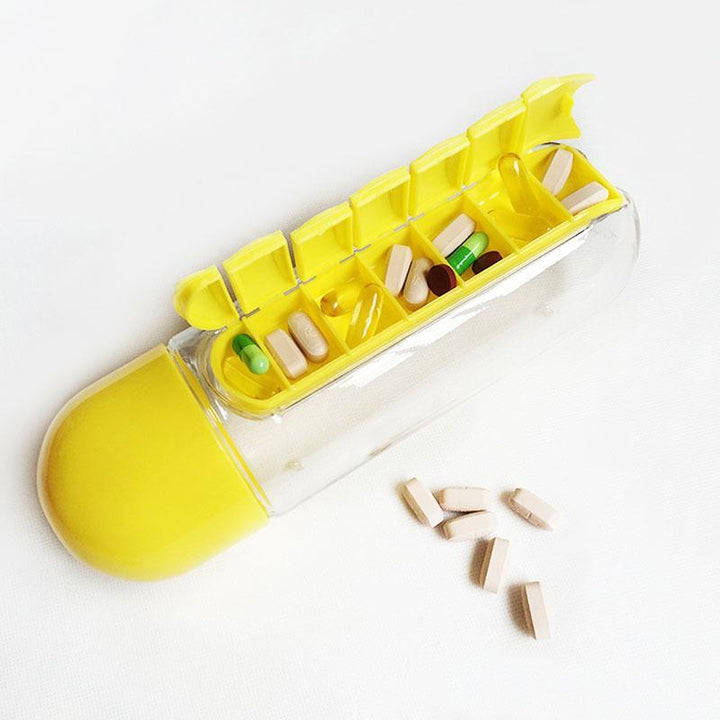 "Unisex 7-dagars pillerkopp med inbyggd organisator, transparent design och färgade sektioner för enkel medicinförvaring."