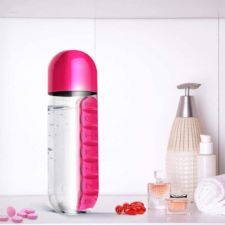 "Unisex 7-dagars pillerkopp med inbyggd organisator, transparent design och färgade sektioner för enkel medicinförvaring."