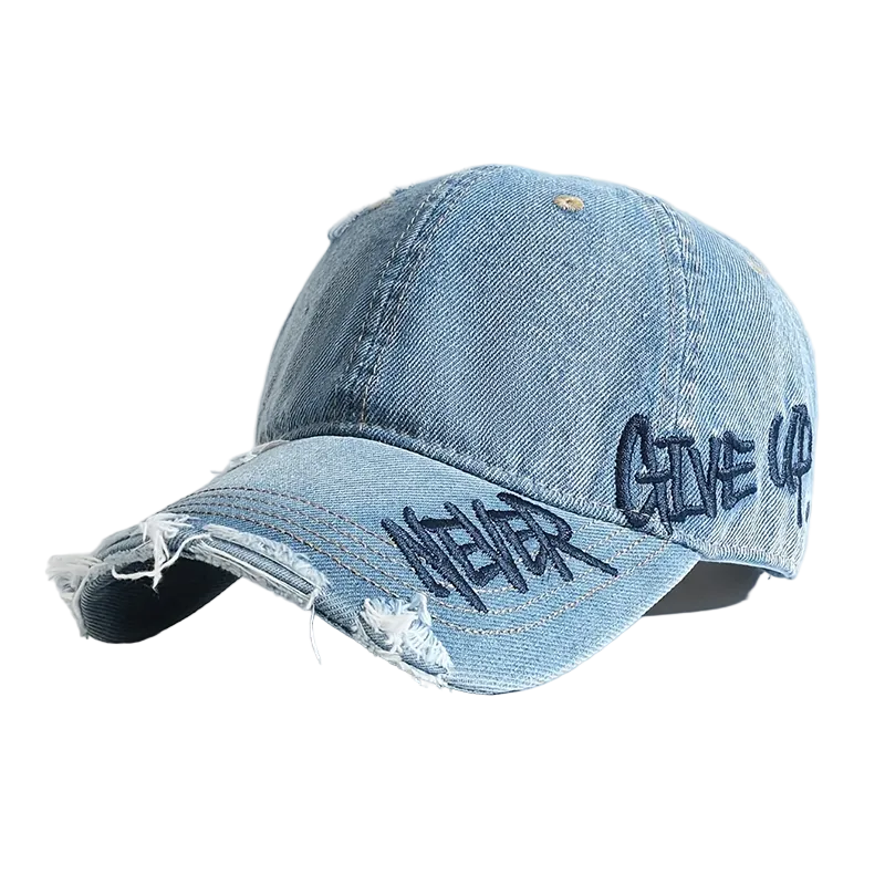 Unisex baseballkeps i distressed denim med detaljerat broderi framtill, perfekt streetwear-accessoar.