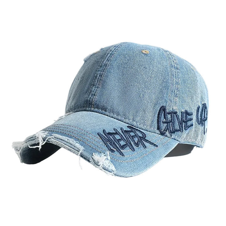 Unisex baseballkeps i distressed denim med detaljerat broderi framtill, perfekt streetwear-accessoar.