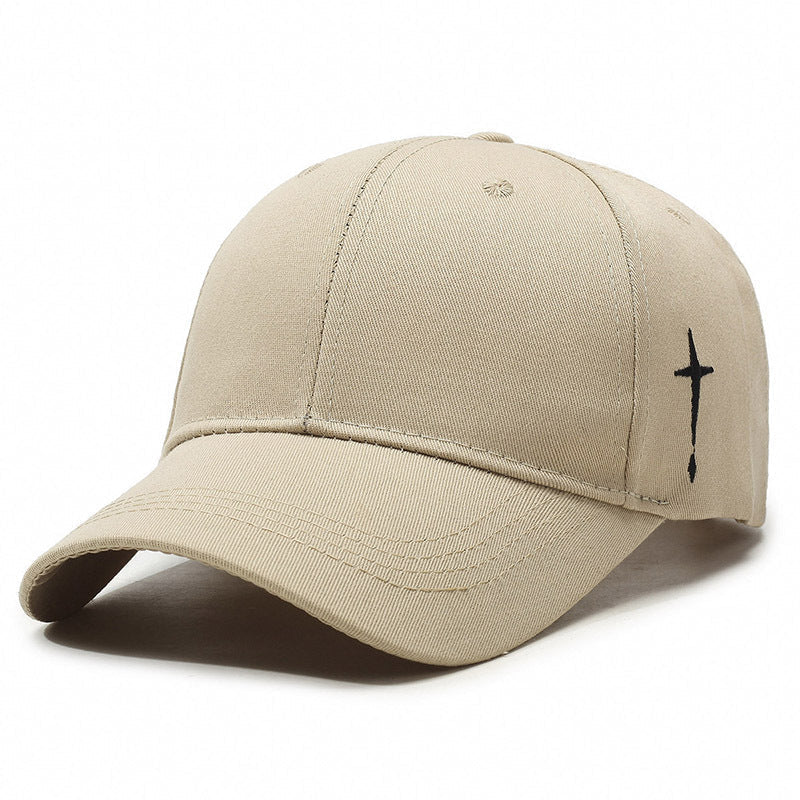 Unisex baseballkeps i korsstil, svart med vit brodyr, justerbar passform för vardagsstil