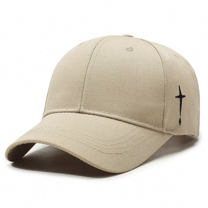 Unisex baseballkeps i korsstil, svart med vit brodyr, justerbar passform för vardagsstil