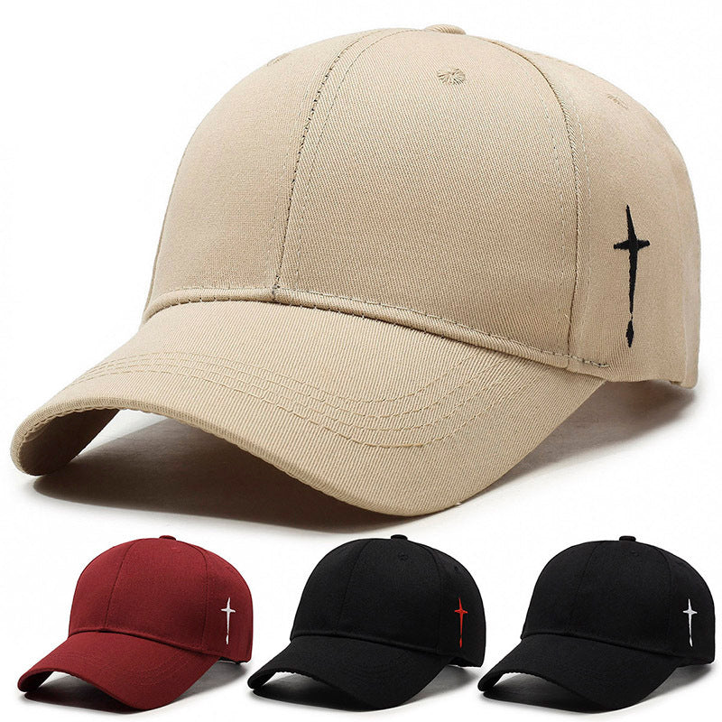 Svart unisex baseballkeps med vit korsbrodyr, perfekt sportig modekeps sommartillbehör