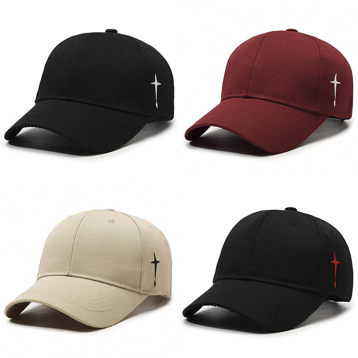 Modekeps: Svart unisex baseballkeps med iögonfallande korsdesign, justerbar för alla