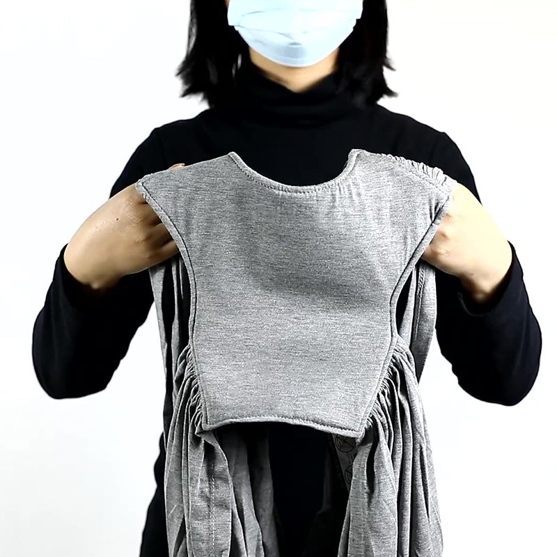"Unisex bebis bärsele i mjuk bomull, ergonomisk design, grå färg, optimal komfort och säkerhet för barn och föräldrar."