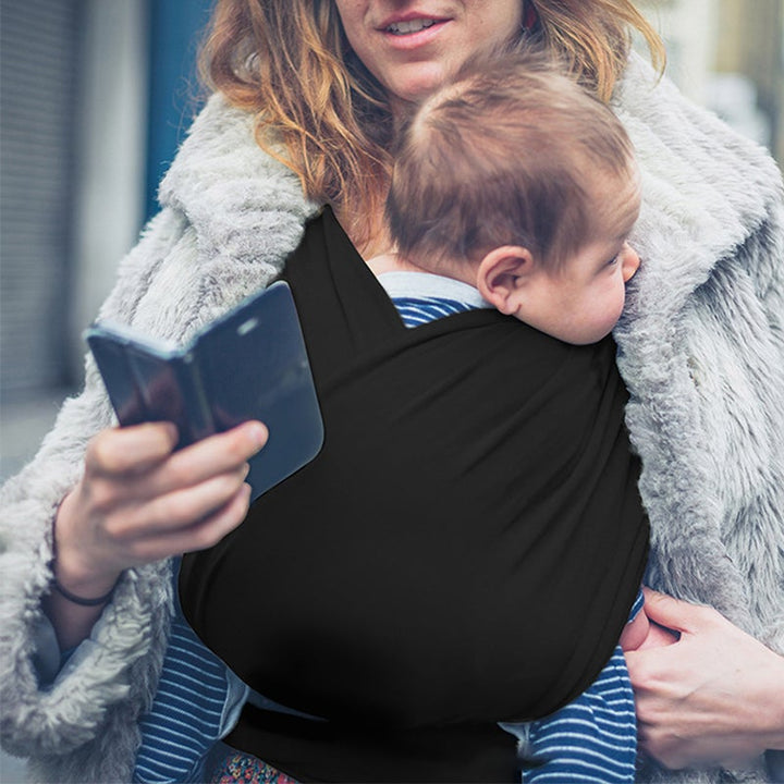 "Unisex bebis bärsele i mjuk bomull, ergonomisk design, grå färg, optimal komfort och säkerhet för barn och föräldrar."
