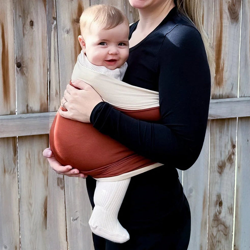 Unisex bekväm babyrygghandduk i karamellfärg, ger handsfree bekvämlighet och stöd, perfekt för föräldrar på språng.