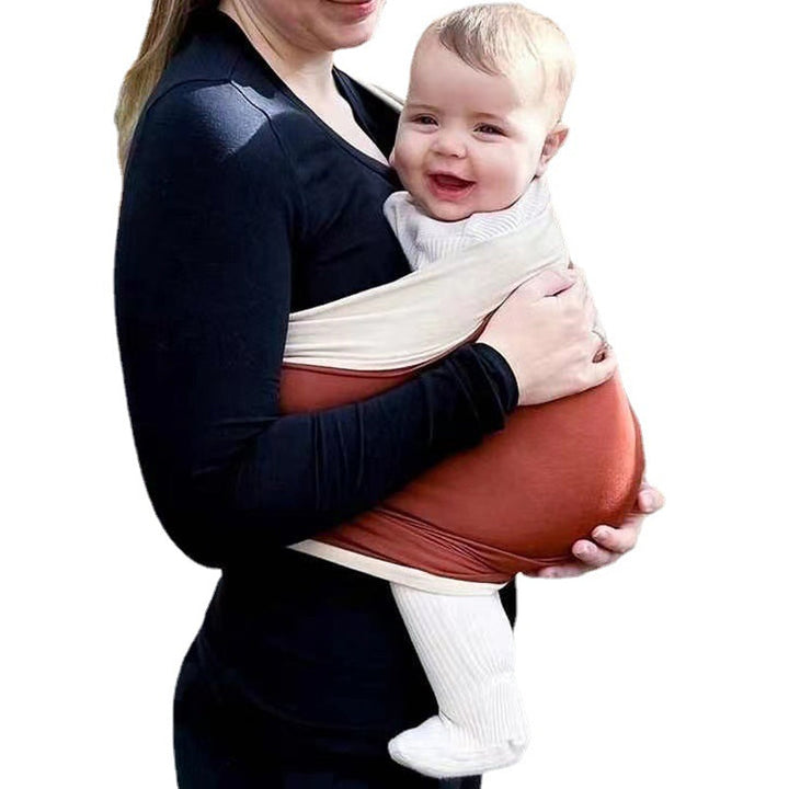 Unisex bekväm babyrygghandduk i karamellfärg, ger handsfree bekvämlighet och stöd, perfekt för föräldrar på språng.