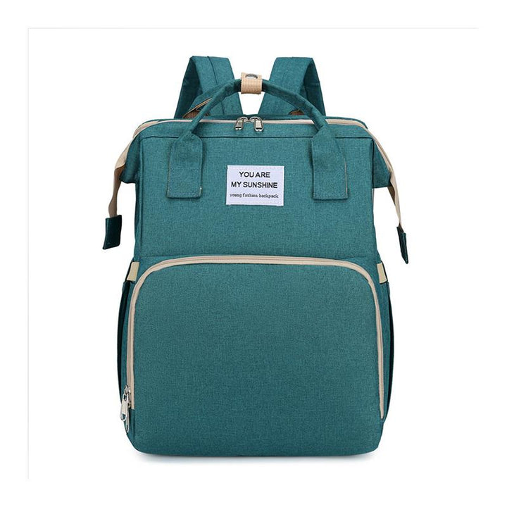 "Unisex blöja ryggsäck med inbyggt skötbord, stort förvaringsutrymme och hållbart, vattentätt Oxford-tyg."