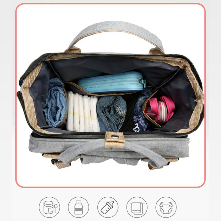 "Unisex blöja ryggsäck med inbyggt skötbord, stort förvaringsutrymme och hållbart, vattentätt Oxford-tyg."