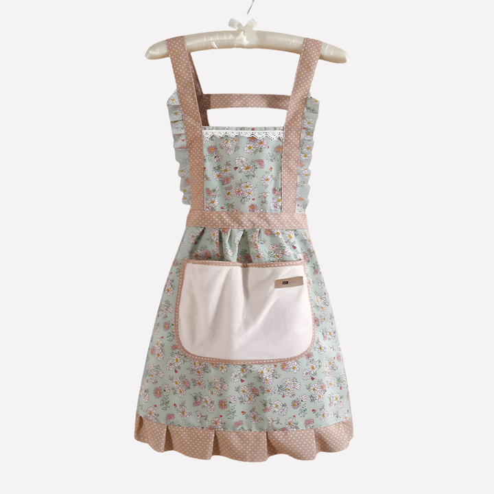 Stilfullt unisex köksskydd med blommönster, perfekt för köket, matlagning, bakning. Dekorativ köksaccessoar.