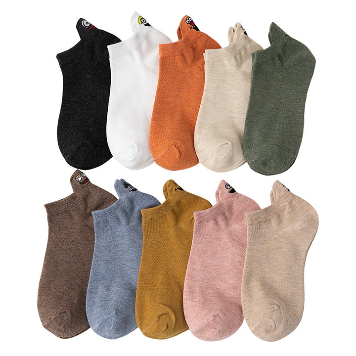 "Unisex broderade crew strumpor, japansk stil med smiley-mönster, mångsidig och elegant design, för alla årstider."