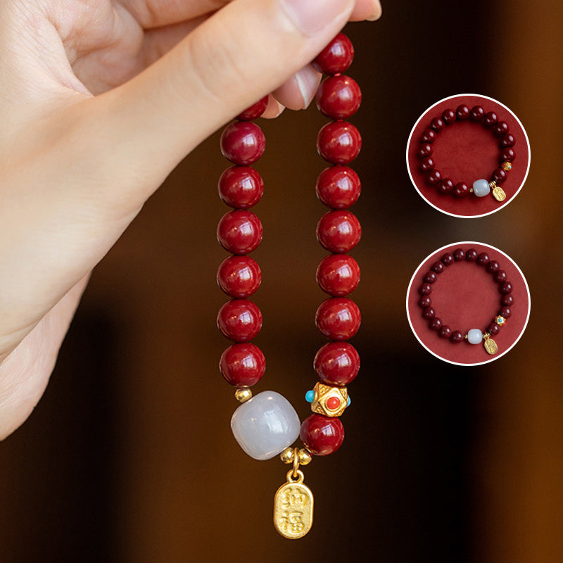 Unisex cinnabar armband i röd jasper med släta pärlor, eleganta och jordande smycken för daglig användning.