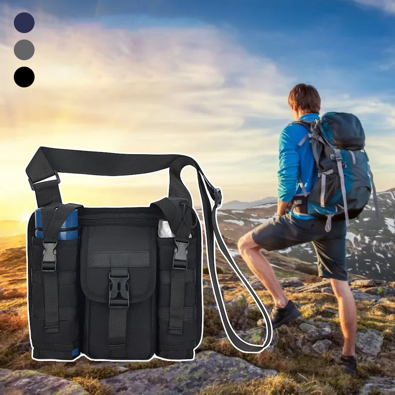 Unisex crossbody axelväska i tåligt tyg, grå. Framifrån med dragkedjor och justerbar rem, perfekt för organiserad förvaring.