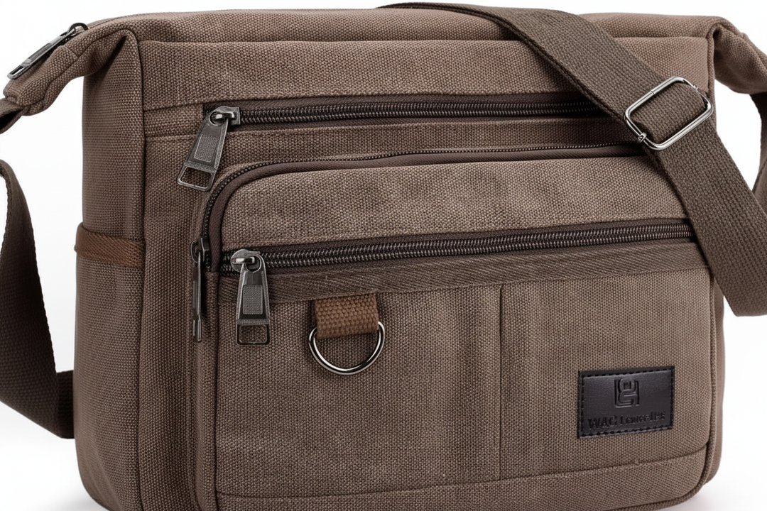 Organiserad unisex crossbodyväska med RFID-skydd, tillverkad i bomull med många fack.