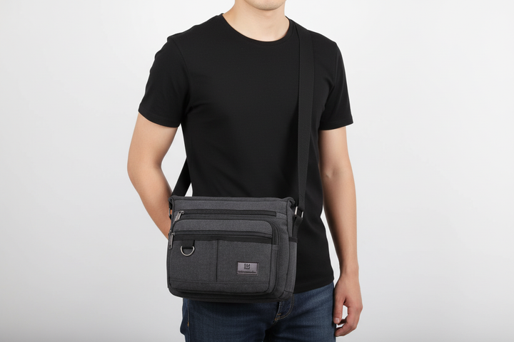 Stilren canvasväska, unisex crossbody med justerbar rem, RFID-skydd och praktiska förvaringsfack.