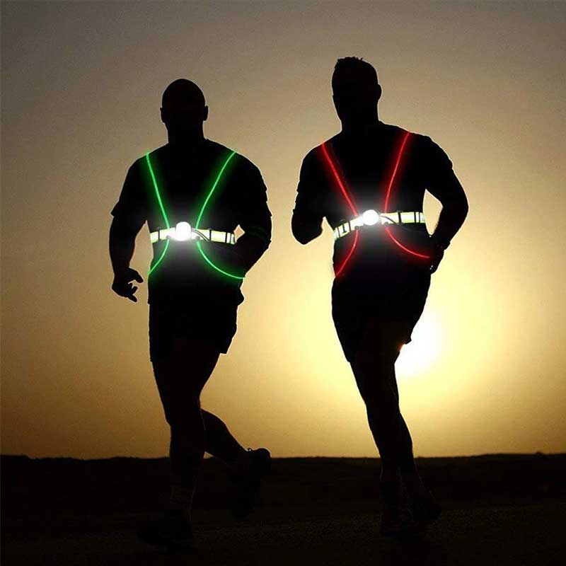 "Unisex flerfärgad reflekterande väst med LED-lampor, justerbara remmar, perfekt för nattsporter som löpning, cykling."