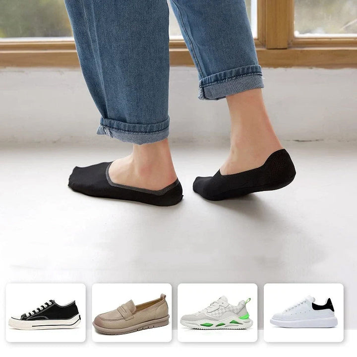 "Unisex halkfria osynliga strumpor i bomull, flera färger, sömlös design mot vit bakgrund."