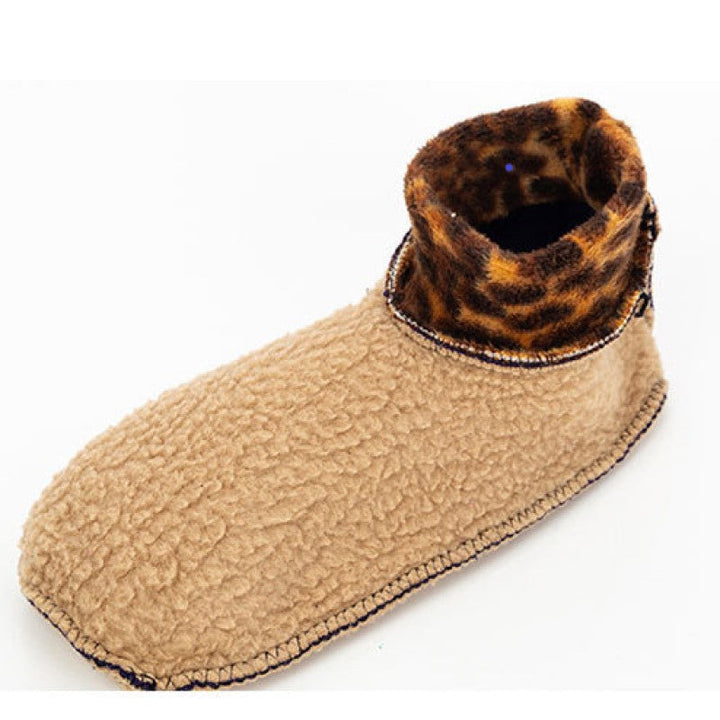 "Unisex halkfria termostrumpor, mjuk grå bomull med silikongrepp, perfekt för säker inomhusanvändning vintertid."