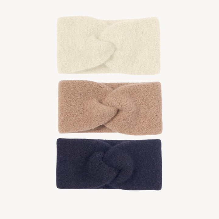 "Unisex huvudband i mjuk ljusrosa babyalpacka, elastisk och stilren design för kalla dagar, dam-accessoar."