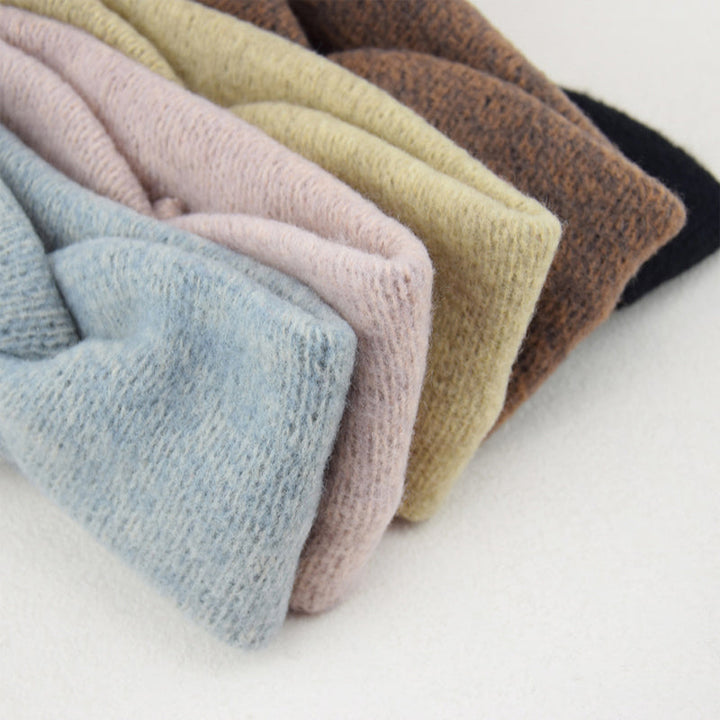 "Unisex huvudband i mjuk ljusrosa babyalpacka, elastisk och stilren design för kalla dagar, dam-accessoar."