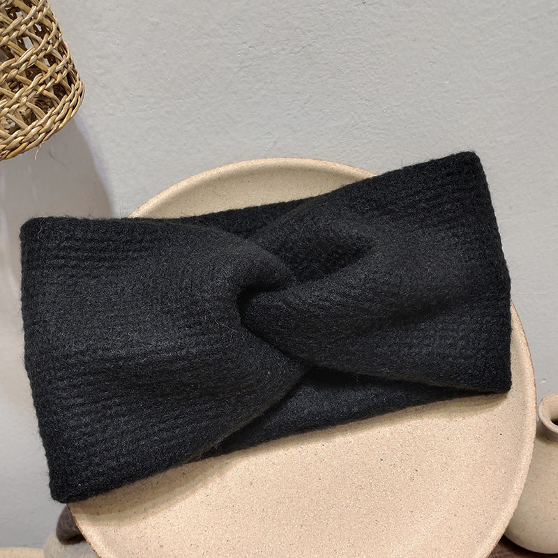 "Unisex huvudband i mjuk ljusrosa babyalpacka, elastisk och stilren design för kalla dagar, dam-accessoar."