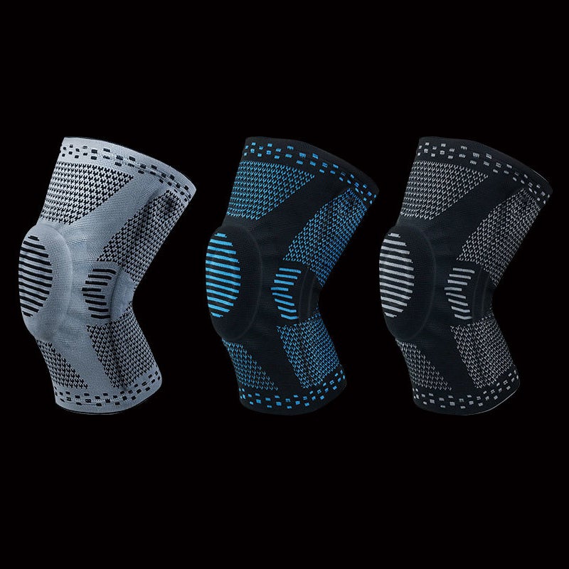 Unisex knäskydd för sport, grått och elastiskt med 3D-stickning, dubbel fjädring och anatomisk gelkudde för stabilitet.