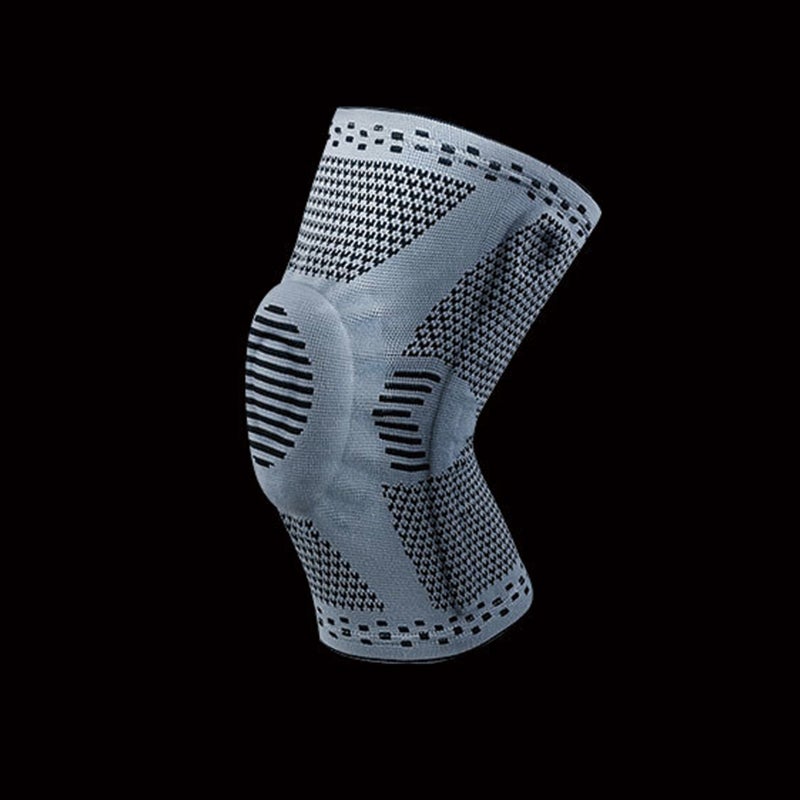 Unisex knäskydd för sport, grått och elastiskt med 3D-stickning, dubbel fjädring och anatomisk gelkudde för stabilitet.