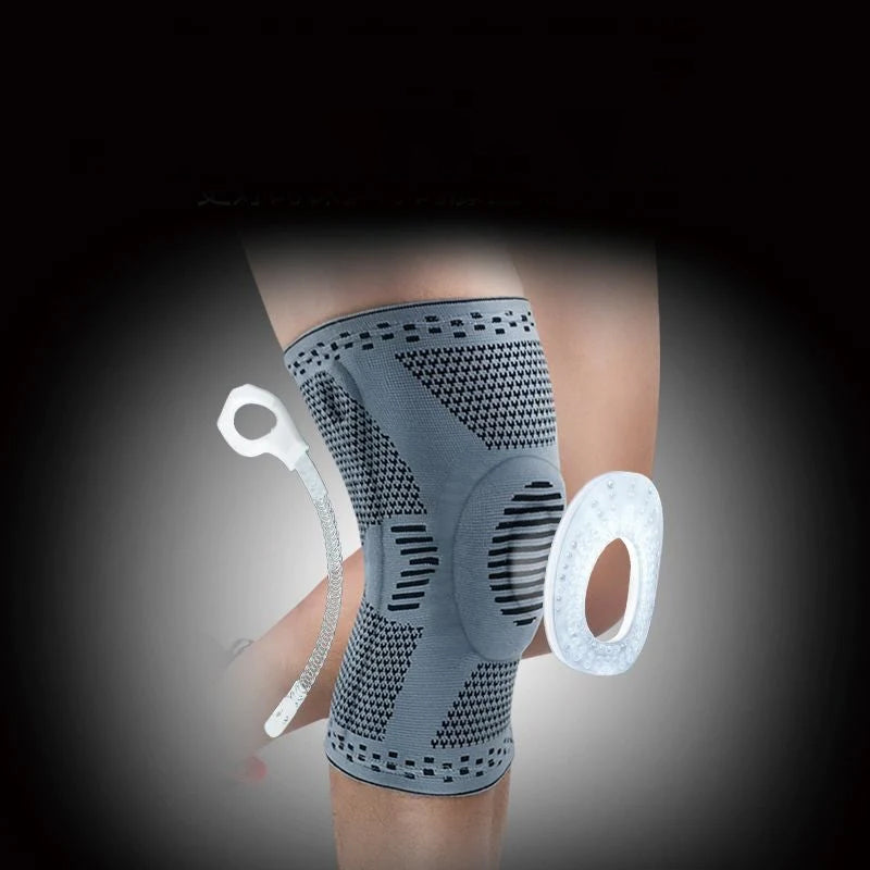 Unisex knäskydd för sport, grått och elastiskt med 3D-stickning, dubbel fjädring och anatomisk gelkudde för stabilitet.