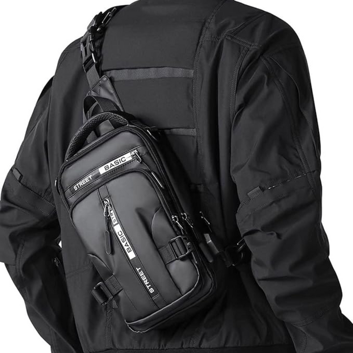 Unisex kompakt slingryggsäck i grå färg, perfekt som vardagsväska för äventyr och resor.