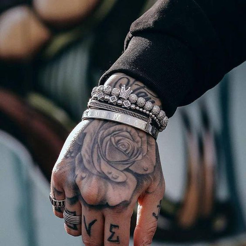 "Unisex kronarmband med zirkonkrona i flera färger: silver, guld, svart, ros guld; stilrent och elegant smycke."