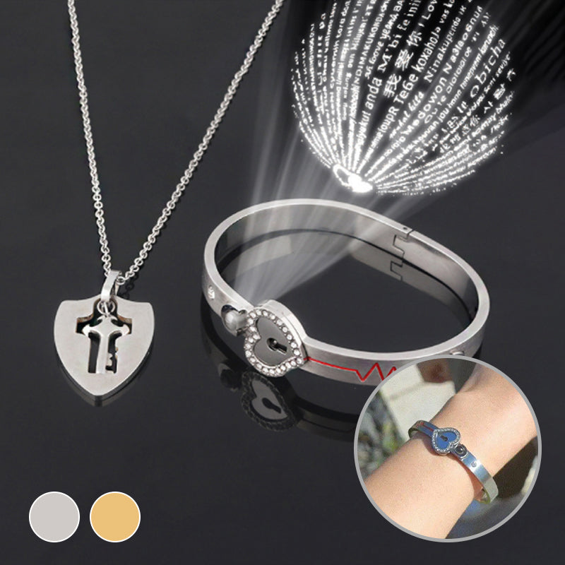 Unisex låsarmband och nyckelhalsband i titanstål, elegant design i stål och roséguld, stilfullt och hållbart smyckeset.