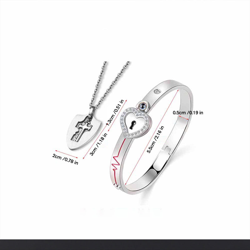 Unisex låsarmband och nyckelhalsband i titanstål, elegant design i stål och roséguld, stilfullt och hållbart smyckeset.