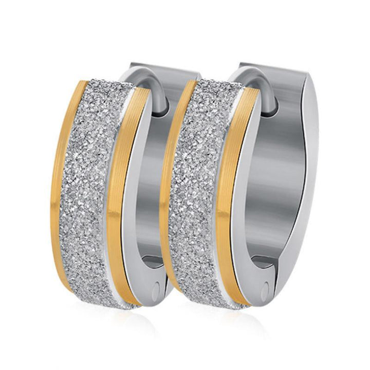 "Unisex magnetiska örhängen i rostfritt stål, elegant rund design i silver och guld, perfekt som trendig accessoar."