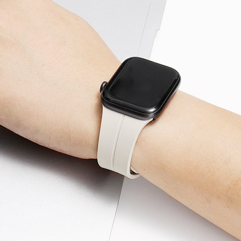 Unisex magnetiskt armband i mjukt silikon med starkt magnetspänne för iWatch, stilrent och justerbart för perfekt passform.