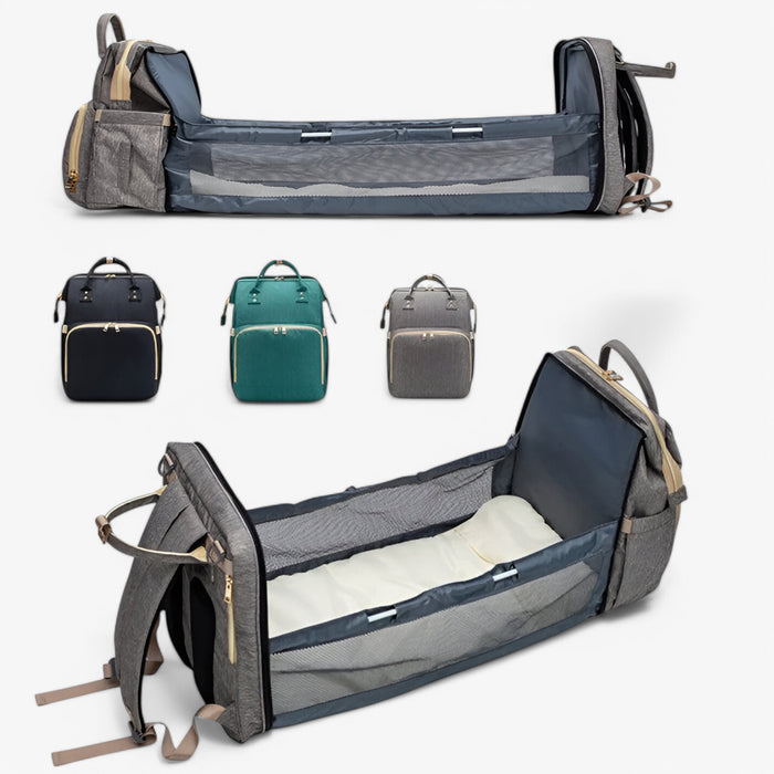 Vattenresistent unisex skötväska med många fack och utdragbar babysäng. Praktisk för föräldrar.