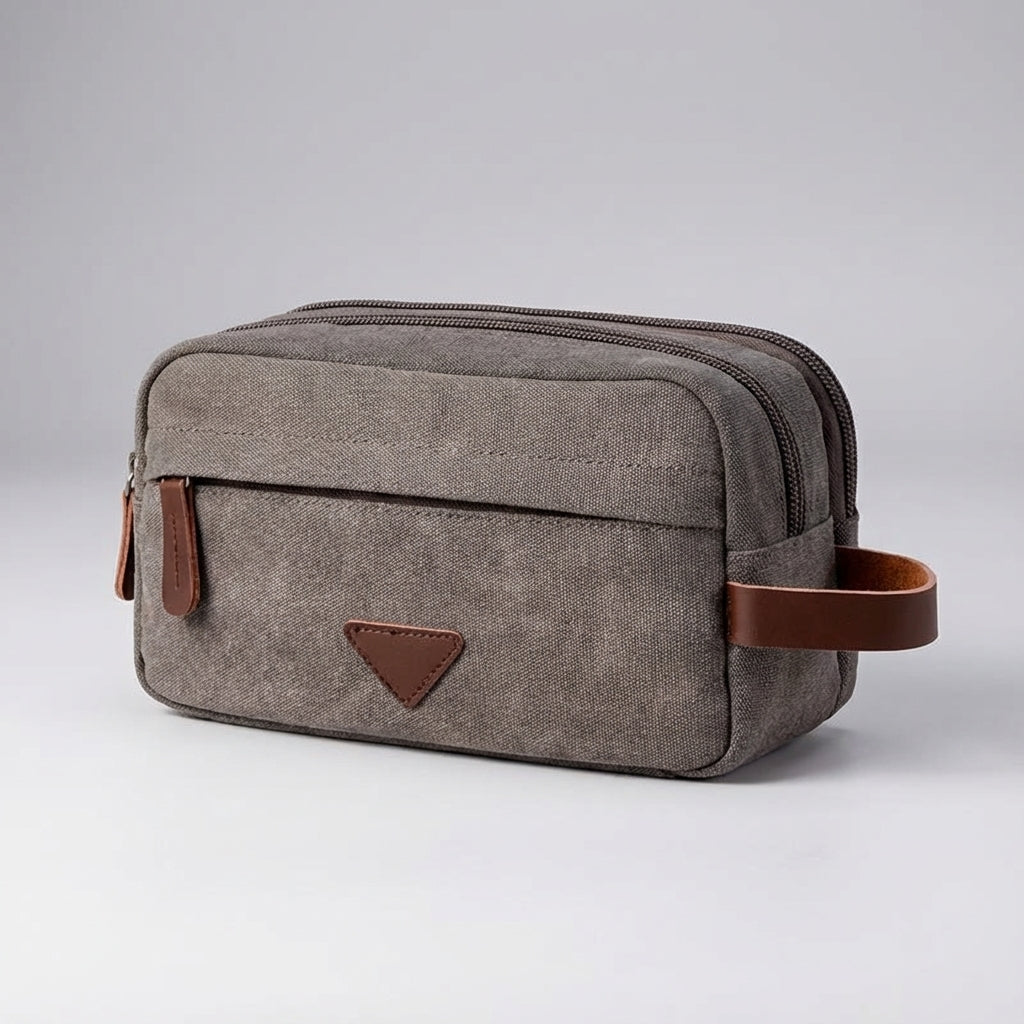 Robust canvas toalettväska, vattentät och unisex, för säker förvaring på alla resor.