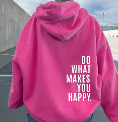 Mjuk unisex hoodie med unik motiverande grafik på ryggen, idealisk för vardagsbruk.