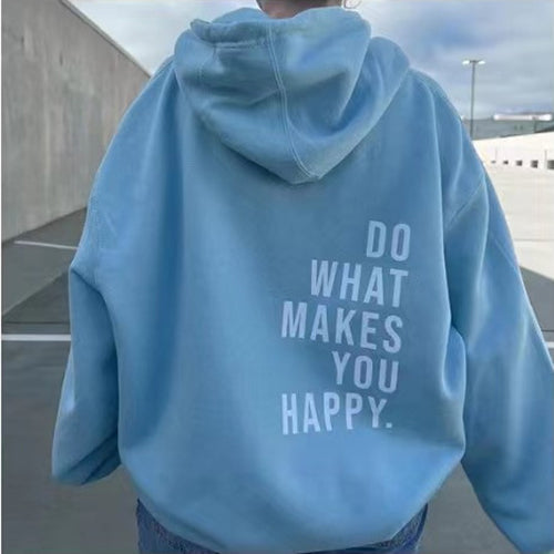 Avslappnad unisex hoodie med budskapstryck på ryggen, en mångsidig överdel för alla.