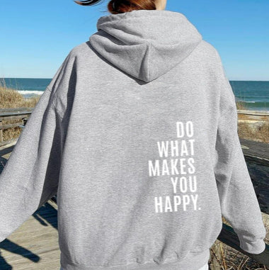 Streetwear-redo hoodie med avslappnad passform och inspirerande text, ett måste för din garderob.