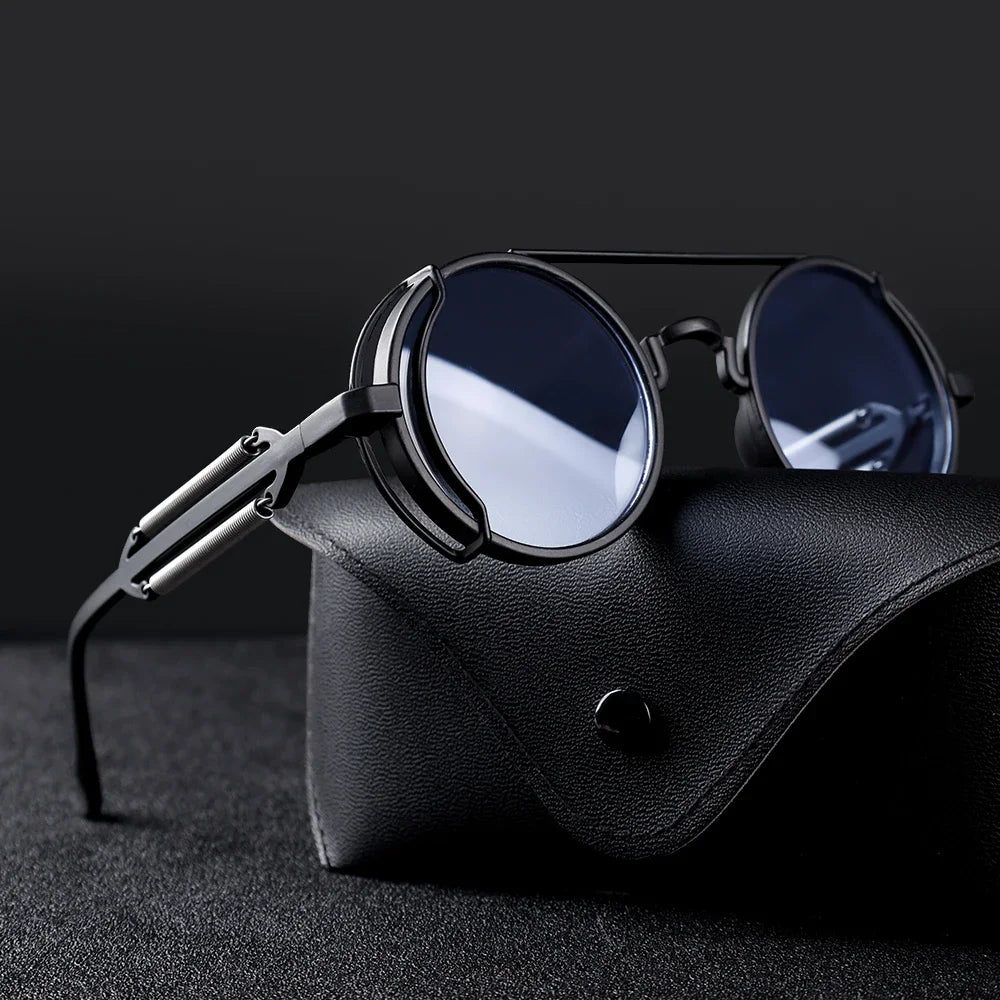 Edgy retro solglasögon med runda linser. Unisex modeaccessoar med mekaniska detaljer för trendig stil.