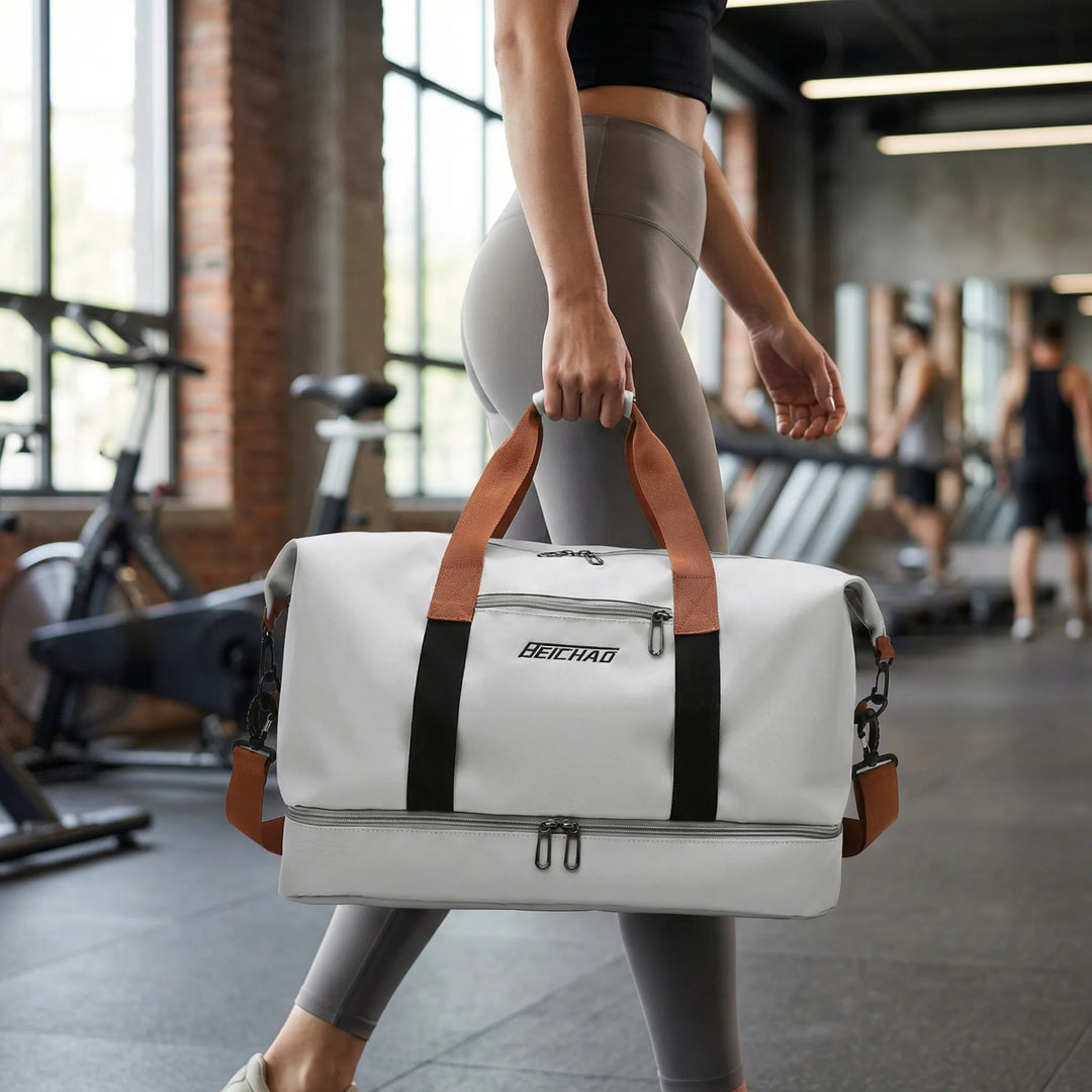 Unisex rymlig sportväska med praktiskt skofack och våtfack. Idealisk träningsväska för gym och resor.
