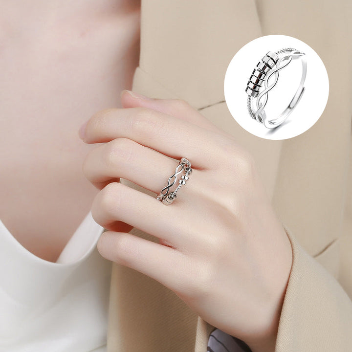 "Unisex silver infinity fidget ring med justerbar design, kedjelänkmönster, perfekt för stresslindring och stil."