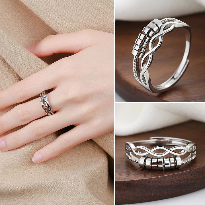 "Unisex silver infinity fidget ring med justerbar design, kedjelänkmönster, perfekt för stresslindring och stil."