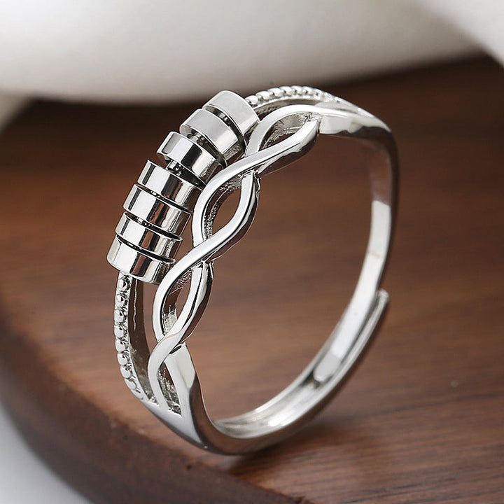 "Unisex silver infinity fidget ring med justerbar design, kedjelänkmönster, perfekt för stresslindring och stil."
