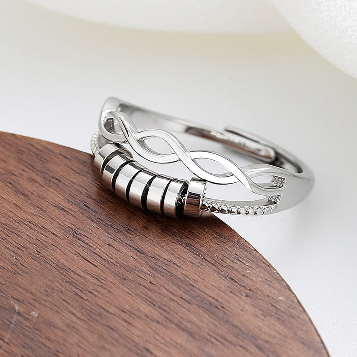 "Unisex silver infinity fidget ring med justerbar design, kedjelänkmönster, perfekt för stresslindring och stil."
