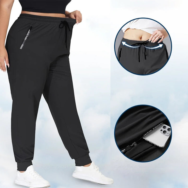 "Unisex snabbtorkande stretchbyxor för friluftsliv, anpassade för alla väder, med elastiskt midjeband och dragkedjefickor."
