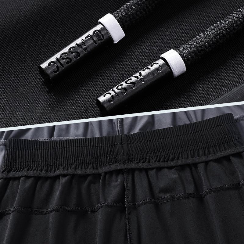 "Unisex snabbtorkande stretchbyxor för friluftsliv, anpassade för alla väder, med elastiskt midjeband och dragkedjefickor."