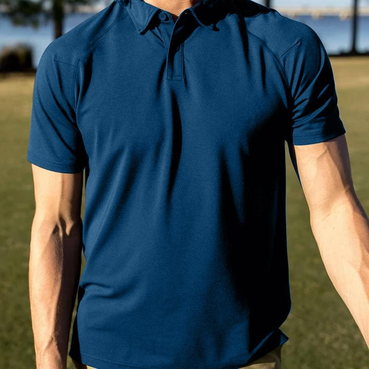 Unisex snabbttorkande pikétröja i blått med knappar och korta ärmar, perfekt för sport och fritidsbruk.