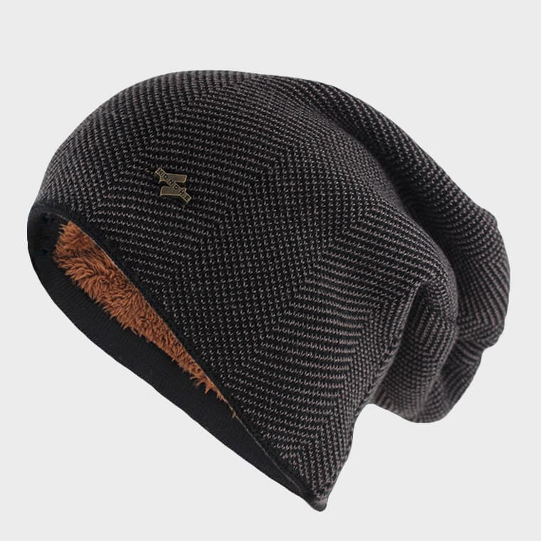 Närbild på textur av stickad unisex vintermössa, mjuk material för maximal komfort och värme